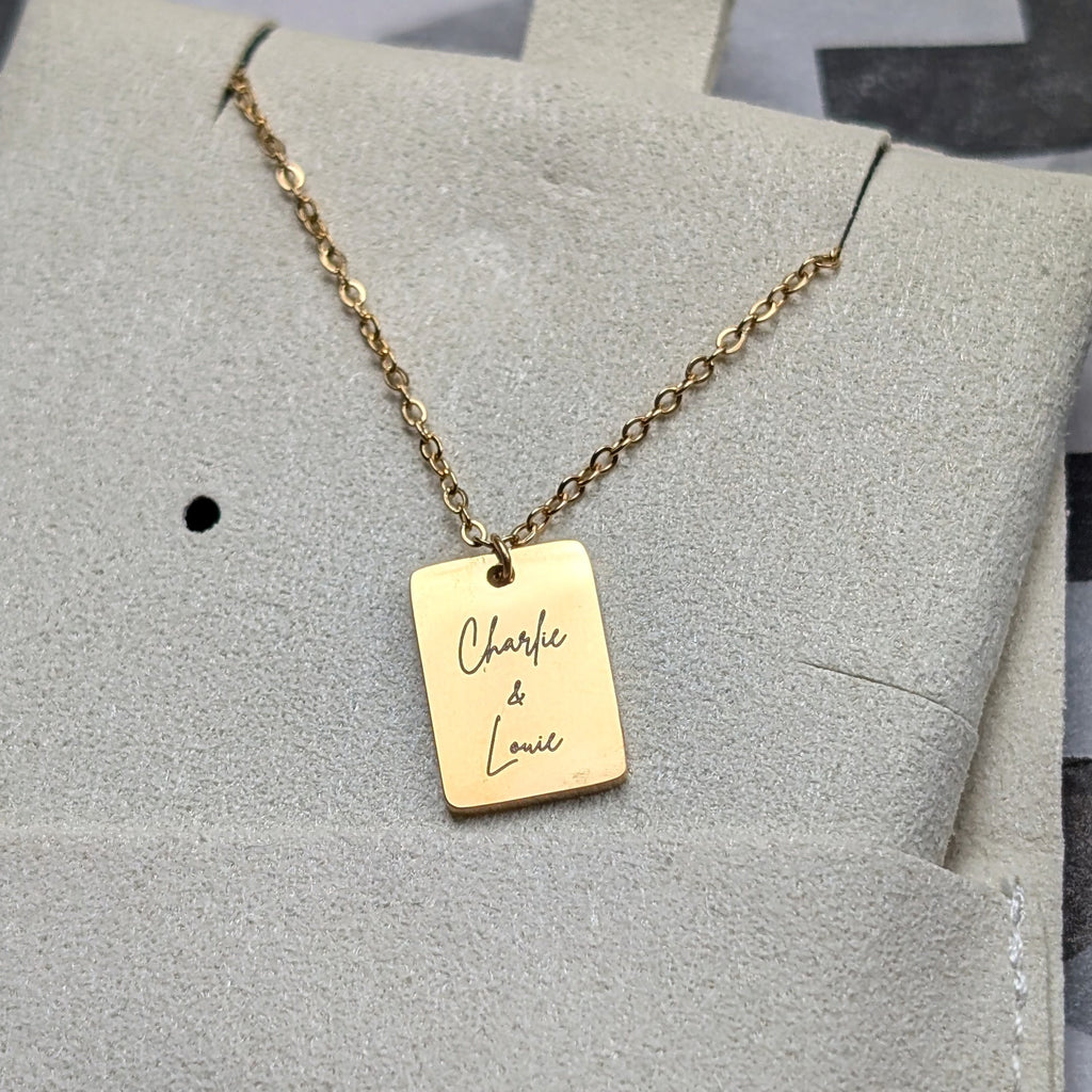 Custom engraved tiny tag necklace