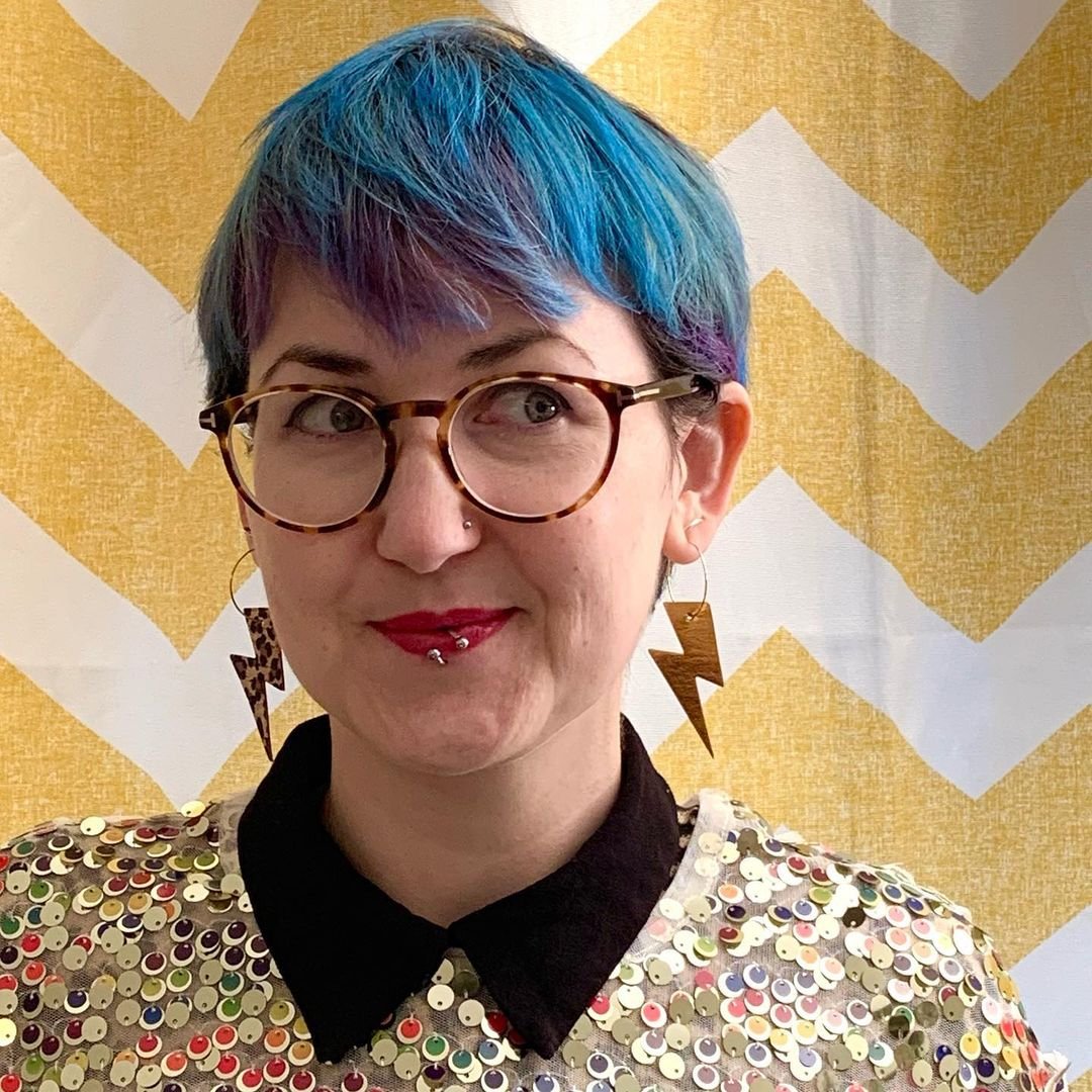 Gold and leopard lightning bolt earrings