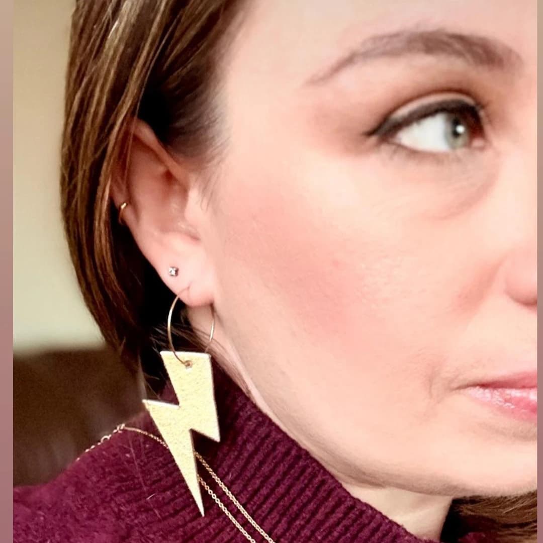 Gold and leopard lightning bolt earrings