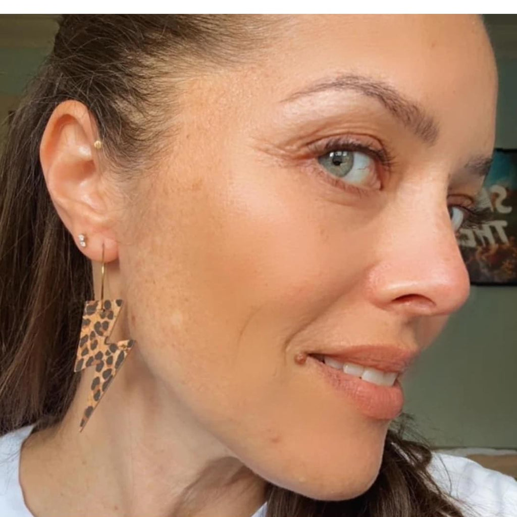 Gold and leopard lightning bolt earrings