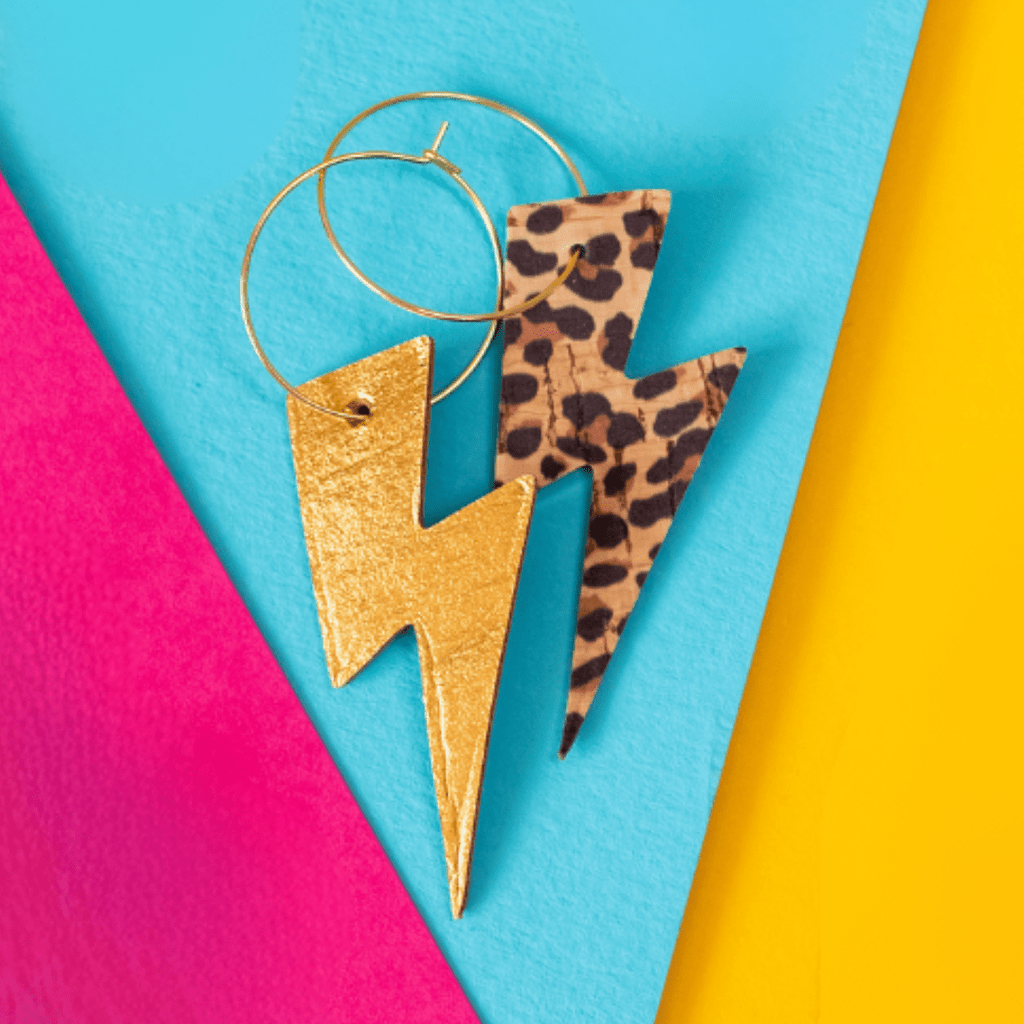 Gold and leopard lightning bolt earrings