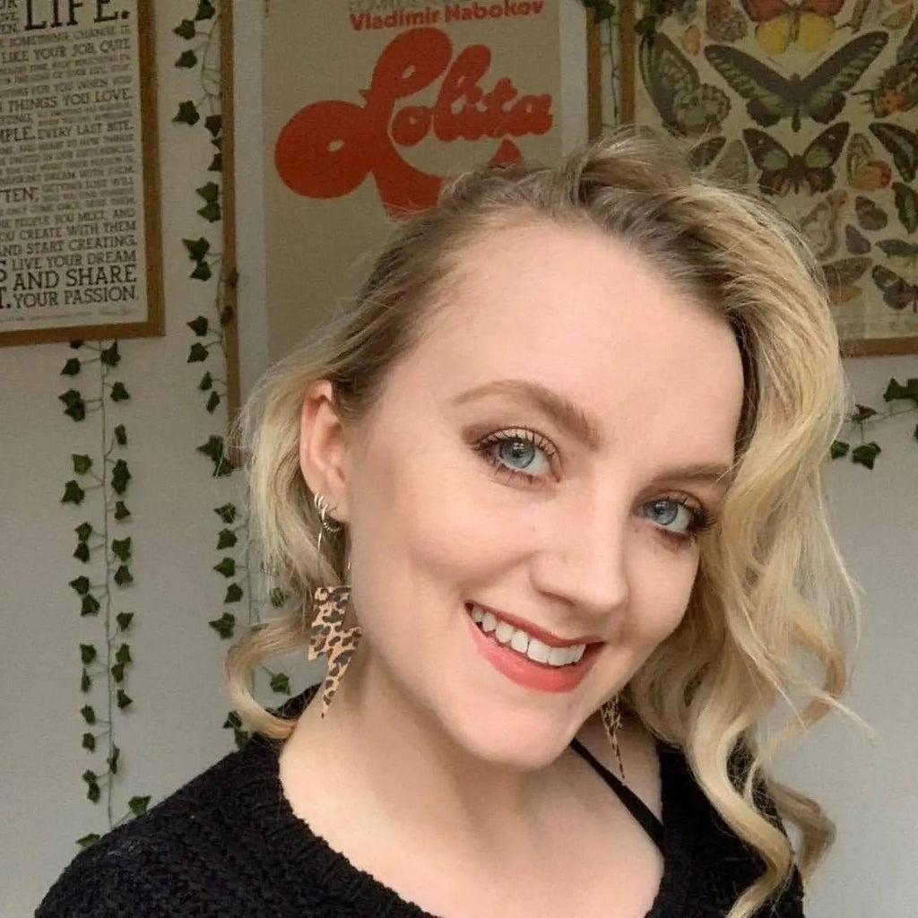 Gold and leopard lightning bolt earrings
